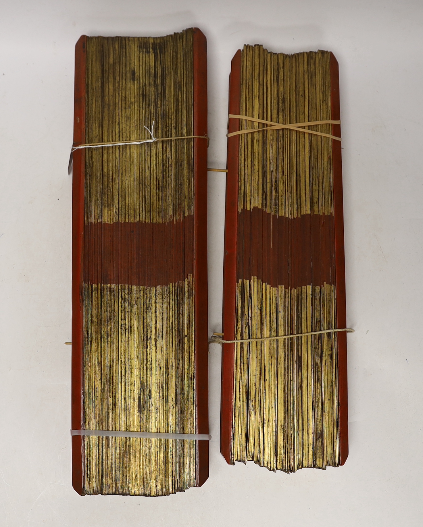 Two 19th/20th century Burmese Buddhist sutra, ink on palm leaves